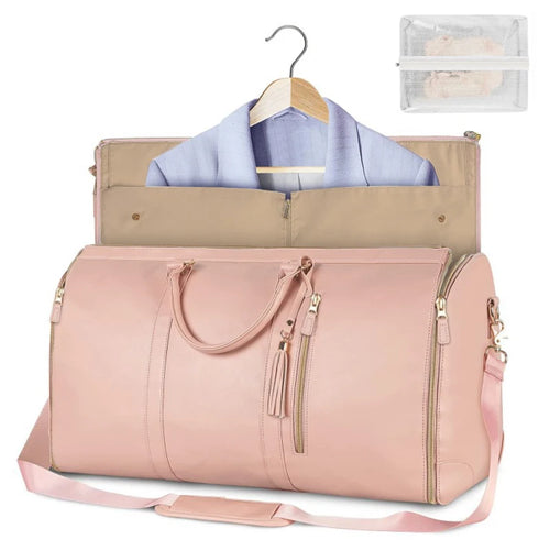 Pink duffel bag with a garment on a hanger and a clear pouch inside, on a white background
